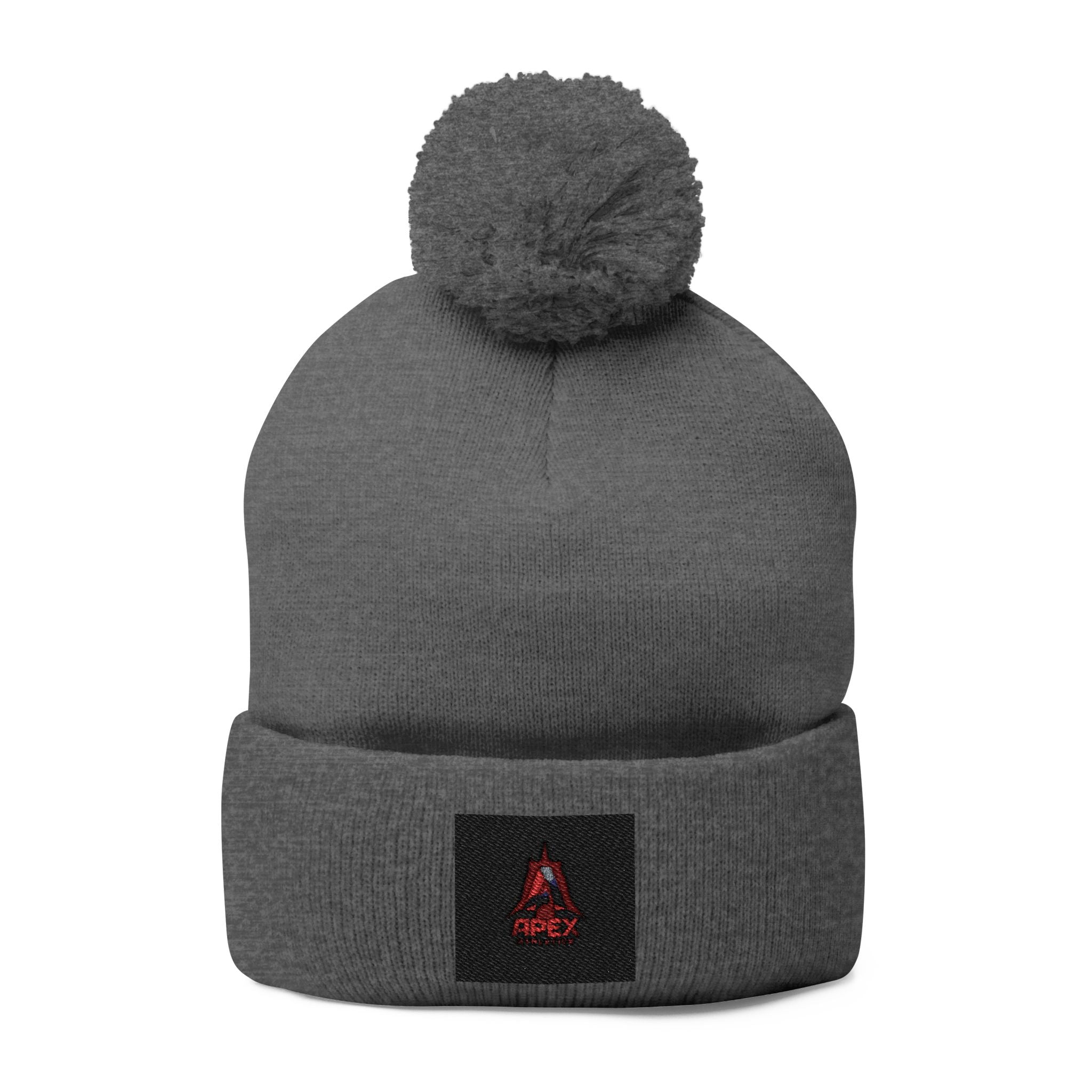 Embroidered Pom-Pom Knit Cap — Cozy Winter Beanie with Small Red Triangle Patch