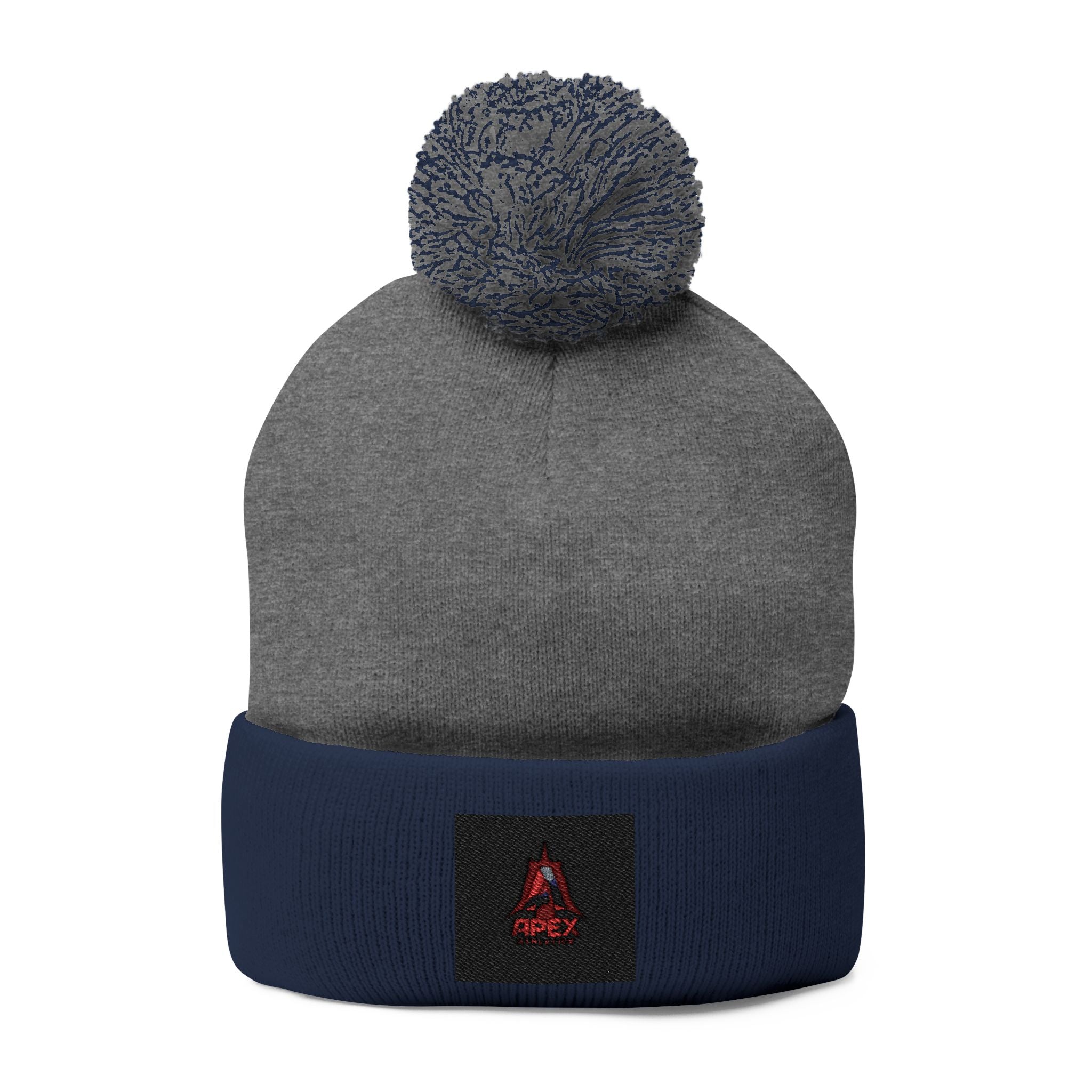 Embroidered Pom-Pom Knit Cap — Cozy Winter Beanie with Small Red Triangle Patch