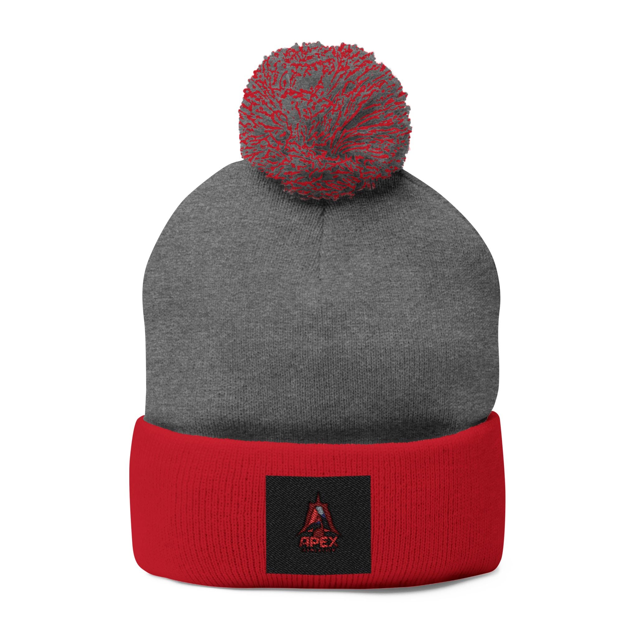Embroidered Pom-Pom Knit Cap — Cozy Winter Beanie with Small Red Triangle Patch